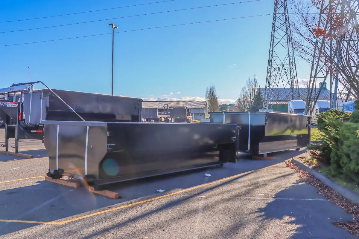 Roll-off dumpster ready for waste disposal at job site for 4 Yard Dumpster Rental in Okmulgee